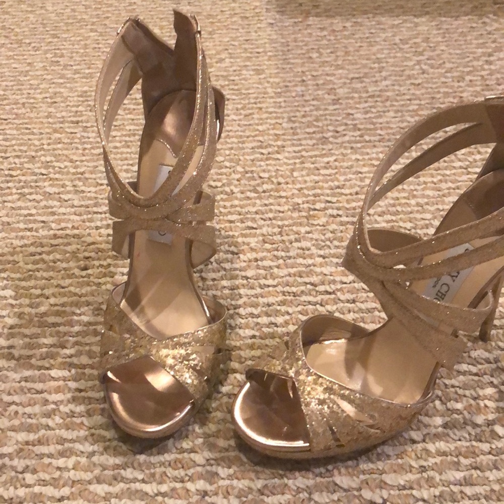 Gorgeous Jimmy Choo. Never worn. Fits like a 8.5.